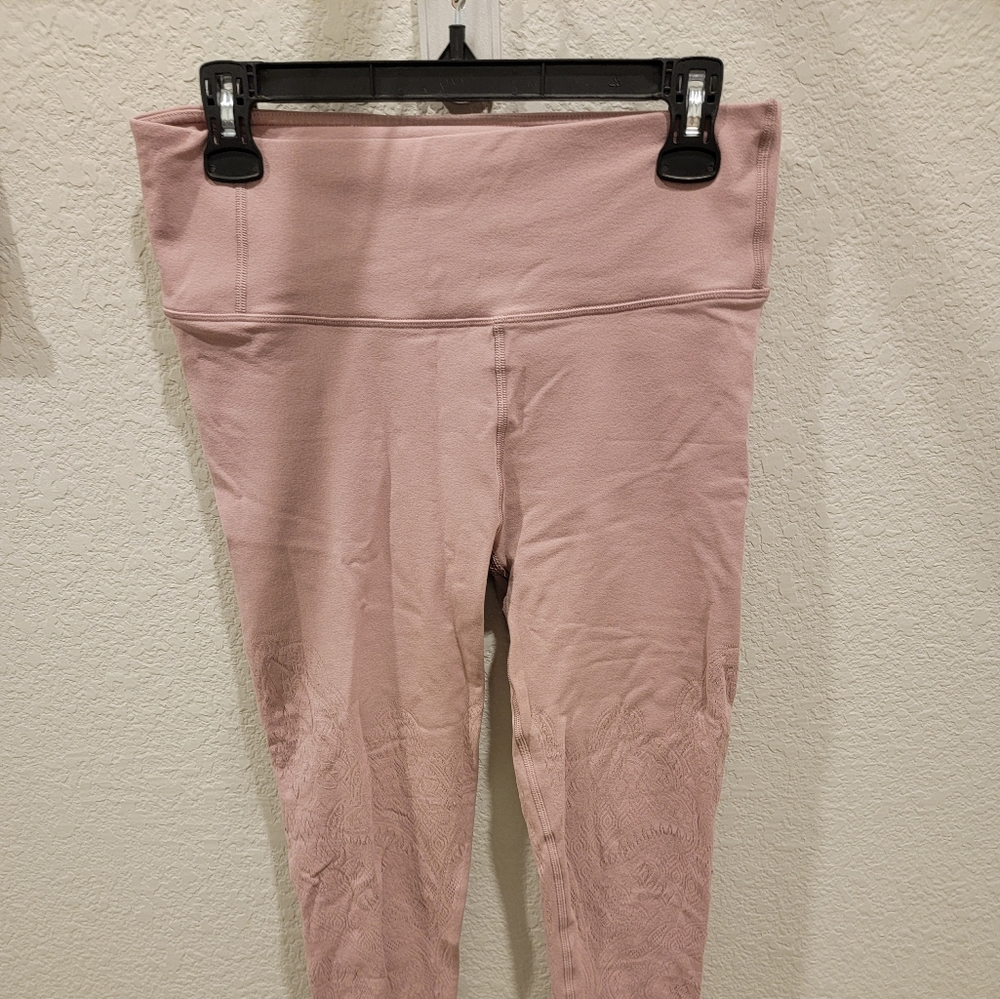 Pink Lululemon size 12/ large leggings